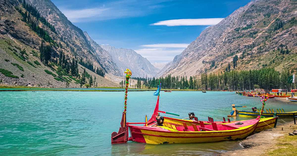 Mahodand Lake in summer crystal clear water and boats