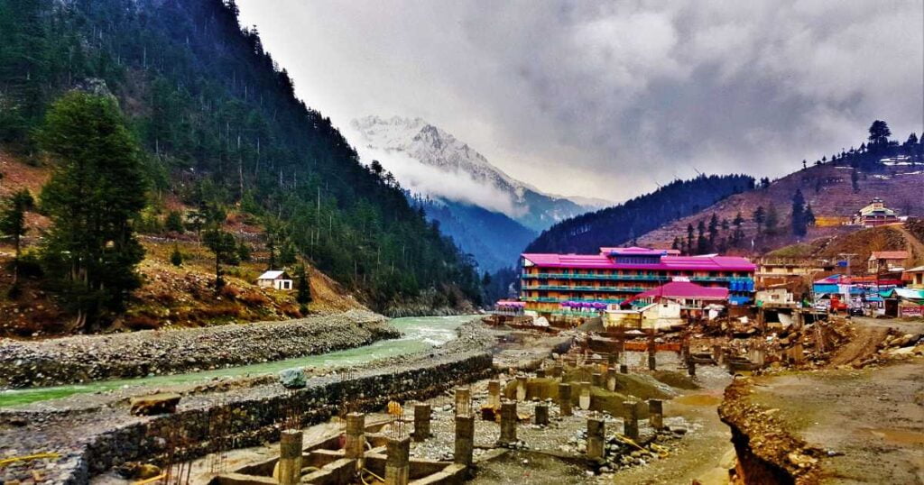 hotel in kalam along the river side, blue sky and clouds