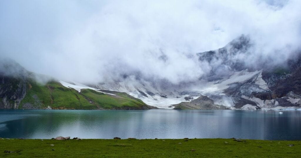 Ratti Gali Lake, mountains and fog over the lake Neelum Valley Azad Kashmir, Pakistan.