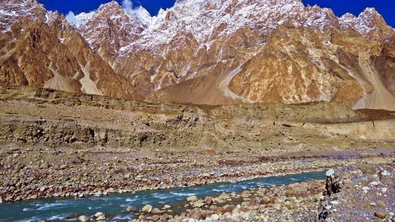 lake and mountains in the Passu Cones, Pakistan.